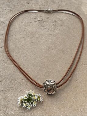 Silpada Ball Pendant on Silpada Brown Leather Double-Strand cord.